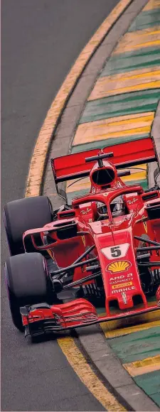  ?? EPA ?? Sebastian Vettel, 30 anni, azzarda sul cordolo a Melbourne