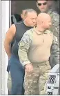  ?? WPLG VIA AP ?? This frame grab from video shows FBI agents escorting Cesar Sayoc, in sleeveless shirt, after his arrest Friday.