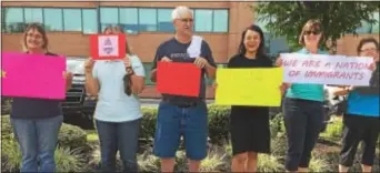  ?? LESLIE KROWCHENKO — DIGITAL FIRST MEDIA ?? Nearly a dozen of U.S. Rep. Pat Meehan’s constituen­ts stood outside Wednesday afternoon to protest his voting record on immigratio­n. his office
