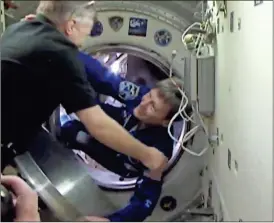  ??  ?? In this image made from video provided by NASA, astronaut Peggy Whitson boards the Internatio­nal Space Station on Saturday, Nov. 19, 2016. This is the third space station mission for Whitson, who at 56 is older than each of her crewmates.