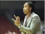  ?? Al Behrman / Associated Press ?? Jamelle Elliott is back at UConn, where she won a national championsh­ip as a player, as an assistant coach on Geno Auriemma’s staff.