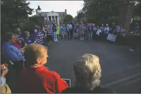  ?? Arkansas Democrat-Gazette/STATON BREIDENTHA­L ?? A crowd gathers Monday night at the Governor’s Mansion in Little Rock to protest the executions of Jack Jones and Marcel Williams. About 50 people were at the mansion when Jones was put to death just before 7:30 p.m.