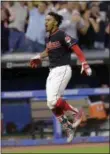  ?? TONY DEJAK — THE ASSOCIATED PRESS ?? The Indians’ Francisco Lindor celebrates as he runs the bases after hitting a walkoff homer.