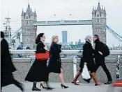  ?? TIM IRELAND/AP ?? British company dress codes requiring female workers to wear high heels came under sharp criticism in Parliament.