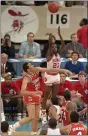  ?? BILL HABER — THE ASSOCIATED PRESS ?? Indiana’s Keith Smart puts Indiana ahead by one point in the final seconds as Howard Triche defends March 30, 1987, in New Orleans.