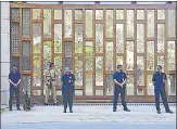  ?? PTI ?? Security personnel outside Mukesh Ambani’s residence in Mumbai on Friday.