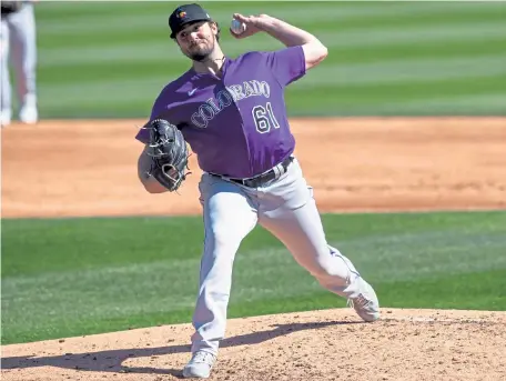  ?? Rob Tringali, Getty Images ?? Rockies reliever Ben Bowden pitchers March 1 against the Dodgers at Camelback Ranch in Glendale, Ariz.