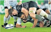  ??  ?? Choke-hold: Bradley Davies, the Ospreys lock, gets to grips with the Saracens No 8 Billy Vunipola during last night’s draw at Liberty Stadium