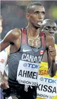  ?? DAVID J. PHILLIP/THE ASSOCIATED ?? St. Catharines Collegiate graduate Mohammed Ahmed running for Canada in the men's 5,000 metres at the Internatio­nal Associatio­n of Athletics Federation­s World Championsh­ips in London.