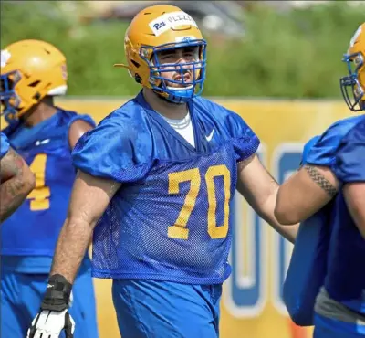 ?? Matt Freed/ Post- Gazette ?? Michigan graduate transfer Nolan Ulizio is being cemented into the rebuilt Pitt offensive line at tackle.