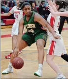  ?? DANA JENSEN/THE DAY ?? Xaryia Melendez of New London (34) drives to the basket against NFA’s Maddy Perrino (21) during Thursday night’s ECC Division I girls’ basketball game at Norwich. New London won 5438 to wrap up the Div. I title. Please go to theday.com to view a photo gallery.