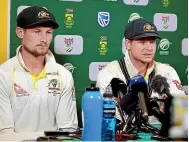  ?? GETTY IMAGES ?? Cameron Bancroft checks his gear for sandpaper and then fronts up with Steve Smith to admit ball-tampering.
