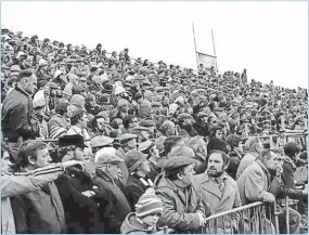  ?? Picture: SUPPLIED ?? A packed Brewery Field crowd endured dismal weather to watch Bridgend take on New Zealand in 1978.