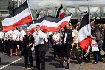  ?? PHOTO ?? Far-right extremists gather to commemorat­e the death of Adolf Hitler’s deputy, Rudolf Hess, in Berlin’s western district of Spandau, on Saturday. AP