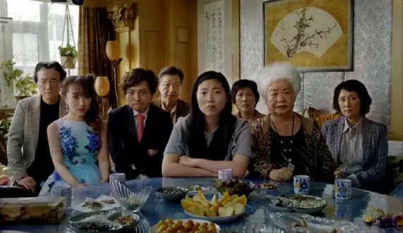  ?? A24 ?? From left, Jiang Yongbo, Aoi Mizuhara, Han Chen, Tzi Ma, Awkwafina, Li Xiang, Lu Hong and Diana Lin give naturalist­ic performanc­es in “The Farewell.”