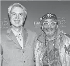  ?? EVAN AGOSTINI/ INVISION/ AP ?? Byrne, left, and director Spike Lee at the New York Film Festival premiere.
