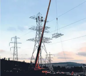  ??  ?? POWER UP: The overhead lines have connected Beauly to Dounreay for 50 years