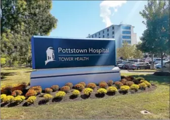  ?? DIGITAL FIRST MEDIA FILE PHOTO ?? A view of the new Pottstown Hospital sign — installed following the completion of the hospital’s sale to Reading Health System — now called Tower Health. Four other regional hospitals were part of the sale including: Phoenixvil­le Hospital, Brandywine...
