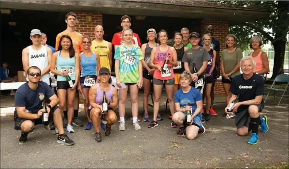  ?? SUBMITTED PHOTO ?? For the Taste of Kutztown’s 5K Run for the Wine, prizes were awarded for individual age categories as well as to male and female overall winners Matt Gillette (15:14.63) and Katlyn Spangler (19:14.33) and male and female masters winners Jeff Fussner (20:51.28) and Raine Fussner (20:47.78). Following the race, runners were able to take advantage of discounted tickets for the tasting event.