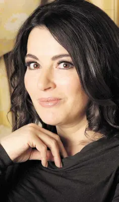  ??  ?? CONTRADICT­ION: Nigella Lawson admits to being a feminist, but her persona and chosen career contradict the stereotype. PHOTO: Gerry Mooney