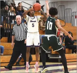  ?? PETE BANNAN — MEDIANEWS GROUP FILE ?? Upper Darby’s, left, takes a shot against Ridley earlier this season. Myers scored 31points in an 83-58loss to Reading Wednesday in the second round of the PIAA Class 6A playoffs.