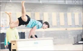  ?? (Photo Darragh Kane) ?? 1st Year Coaching Science and Sport Pedagogy student, Zach McCarthy from Anglesboro, Co Limerick doing some gymnastics at the official opening of the MTU Arena in the Bishopstow­n Campus, Cork this week.
