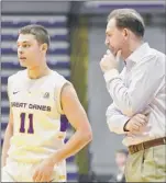  ?? Lori Van Buren / times union ?? ualbany coach Will Brown talks to freshman guard Cameron Healy during a recent game at Sefcu Arena. Healy is averaging 17.9 points per game.