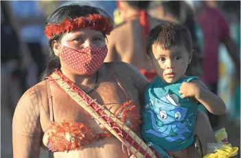  ?? ?? Munduruku poses for a picture in Brasilia.