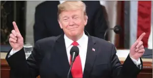  ?? President Trump gestures during the State of the Union address. ??