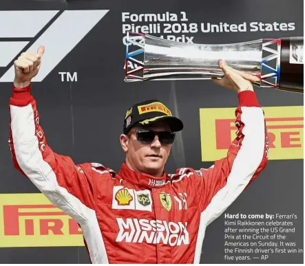  ??  ?? Hard to come by: Ferrari’s Kimi Raikkonen celebrates after winning the US Grand Prix at the Circuit of the Americas on Sunday. It was the Finnish driver’s first win in five years. — AP