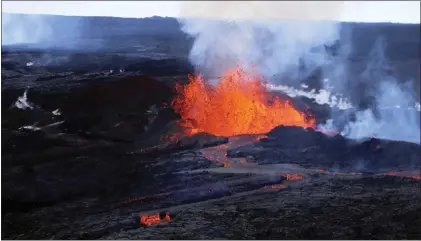  ?? HAWAII DEPT. OF LAND AND NATURAL RESOURCES - VIA THE ASSOCIATED PRESS ?? Lava flows on Mauna Loa, the world’s largest active volcano, on Wednesday near Hilo, Hawaii.