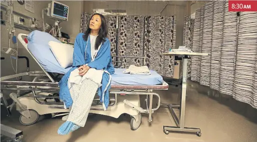  ?? STEVE RUSSELL PHOTOS TORONTO STAR ?? Kaori Noguchi waits for her surgery to begin on Monday. She is the fourth patient at Women’s College to undergo an outpatient hip replacemen­t in the past month.