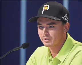  ??  ?? Rickie Fowler wore a Leuk the Duck pin on his hat Thursday in honor of Jarrod Lyle, the golfer who lost his fight with leukemia.