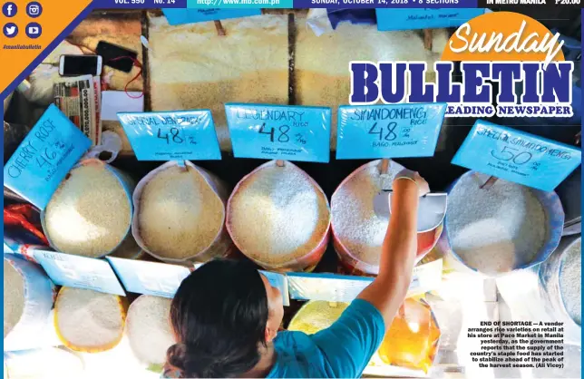  ?? (Ali Vicoy) ?? END OF SHORTAGE — A vendor arranges rice varieties on retail at his store at Paco Market in Manila yesterday, as the government reports that the supply of the country’s staple food has started to stabilize ahead of the peak of the harvest season.