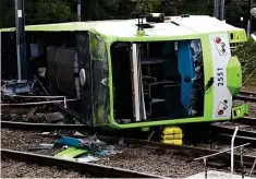  ??  ?? Tragic consequenc­es: The tram overturned at 45mph
