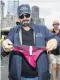  ?? PHOTO: REUTERS ?? Marwan Koukash shows off his Gstring yesterday.