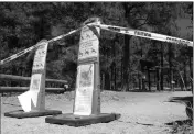  ?? ASSOCIATED PRESS ?? THESE PHOTOS TAKEN May 24 show signs posted at trails leading into the national forest in Flagstaff, Ariz., telling the public no one is allowed in.