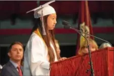  ??  ?? Radnor High School Class of 2017 Valedictor­ian Iris Wang addresses her classmates.