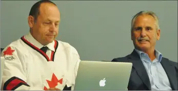  ?? Photos by Jamie Rieger ?? Prairie Rose School Division deputy superinten­dent Kal Koch and former NHL and WHL coach Willie Desjardins chat before the start of the announceme­nt that a hockey academy is coming to three schools in the division. the announceme­nt was made on July 22...