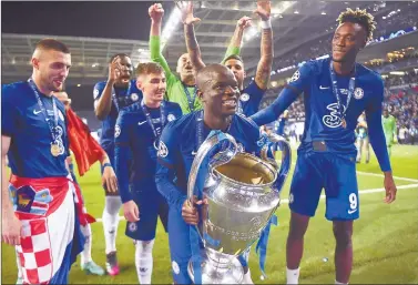 ?? Photo: Nampa/AFP ?? Champions… Chelsea’s French midfielder N’Golo Kante (with trophy) celebrates with teammates after winning the UEFA Champions League final against Manchester City at the Dragao stadium in Porto, Portugal.