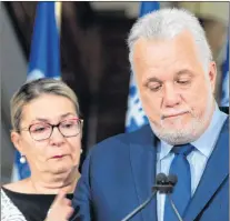  ?? CP PHOTO ?? Quebec Premier and Liberal Leader Philippe Couillard pauses as he gets emotional while announcing his resignatio­n as Premier and MNA for the riding of Roberval, Thursday.