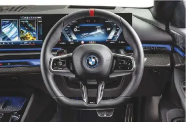  ?? ?? Shiny and contempora­ry ...  is is the inside of the new BMW 5 Series.