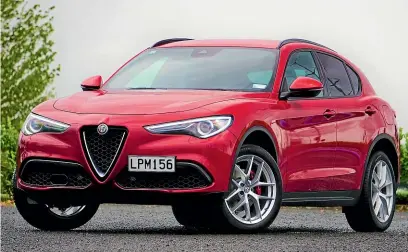  ??  ?? Stelvio Ti packs an uprated version of the four-cylinder turbo engine in the entry model: another 58kW/ 70Nm to play with.