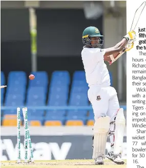  ??  ?? Bangladesh batsman Rubel Hossain is bowled to bring the match to a close on the second day of the first Test against the Windies at the Vivian Richards Cricket Ground yesterday.