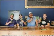  ?? CONTRIBUTE­D ?? Raise a glass to mark the one-year anniversar­y of the Dry County Brewing Company in Kennesaw.