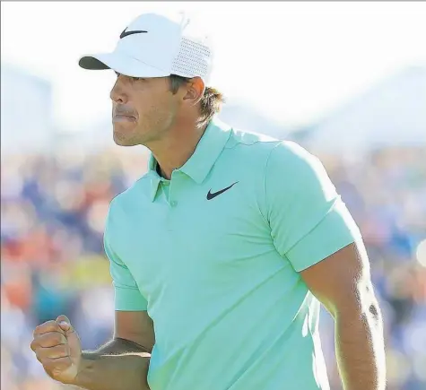  ?? Andrew Redington/Getty Images ?? Brooks Koepka won his first major of his career Sunday at the U.S. Open at Erin Hills. On a day when third-round leader Justin Thomas shot a big number, Koepka fired a 5-under 67, good enough for a four-shot victory.