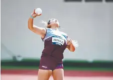  ??  ?? Talia Inivale competes in the girls shot put.