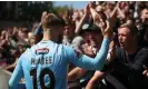  ?? Bradley Collyer/PA ?? Grimsby fans enjoy the semi-final win at Wrexham with John McAtee. Photograph: