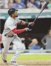  ?? AP PHOTO ?? IN THE SWING: Eduardo Nunez launches a two-run homer during the Sox’ 6-1 victory last night.