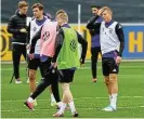  ?? /Kai Pfaffenbac­h /Reuters ?? In training: Germany's Toni Kroos with Thomas Mueller and Jan-Niklas Beste during training.